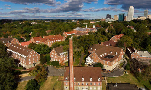 Aerial view of Salem College campus with Winston Salem in the background