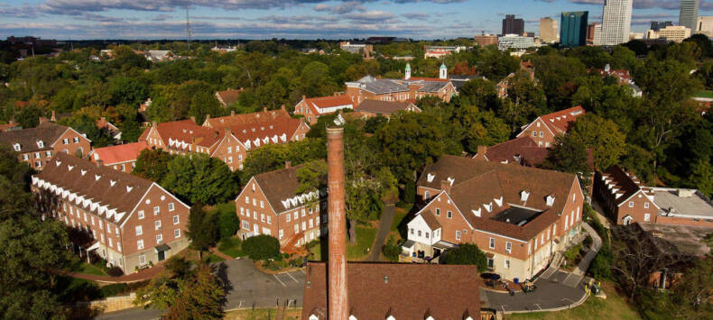 Aerial view of Salem College campus with Winston Salem in the background