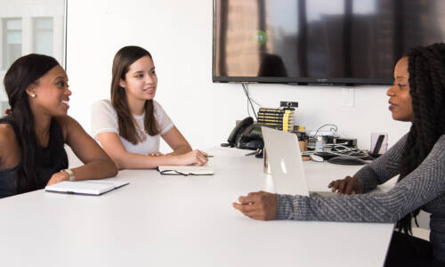 3 women talking through a communications plan