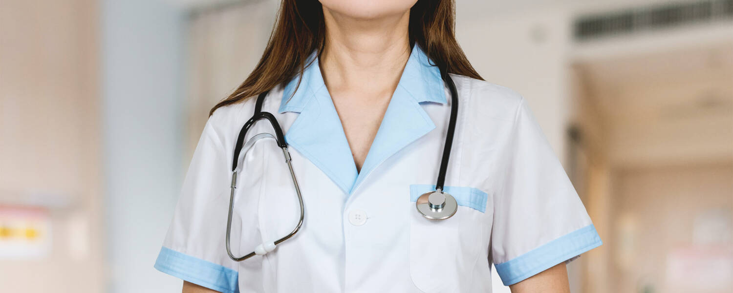 Person with a stethoscope around their neck