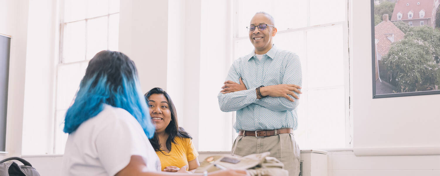 Students with a professor in class at Salem College