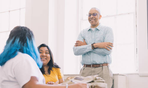 Students with a professor in class at Salem College