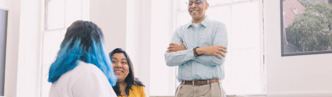 Students with a professor in class at Salem College