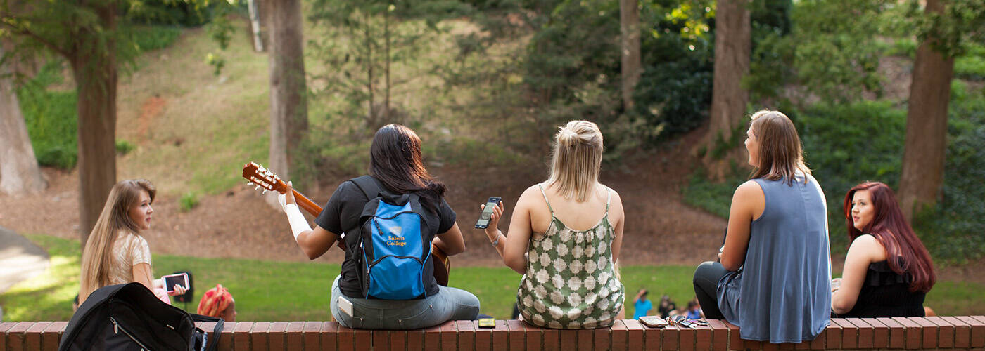 Students playing music at the May Dell at Salem College