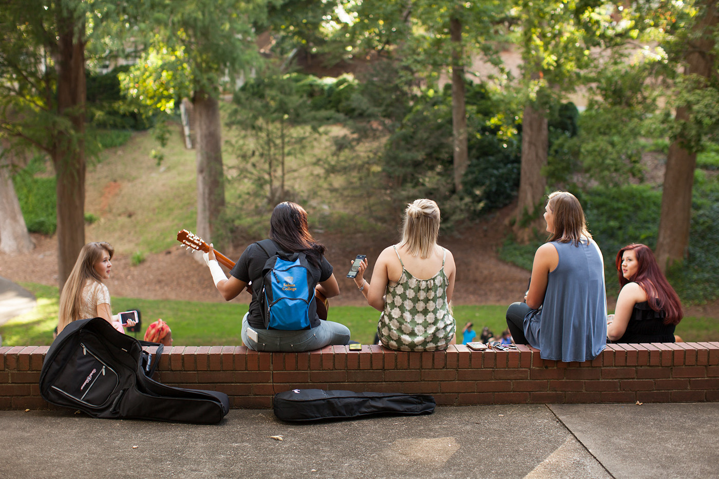 Students playing music at the May Dell at Salem College
