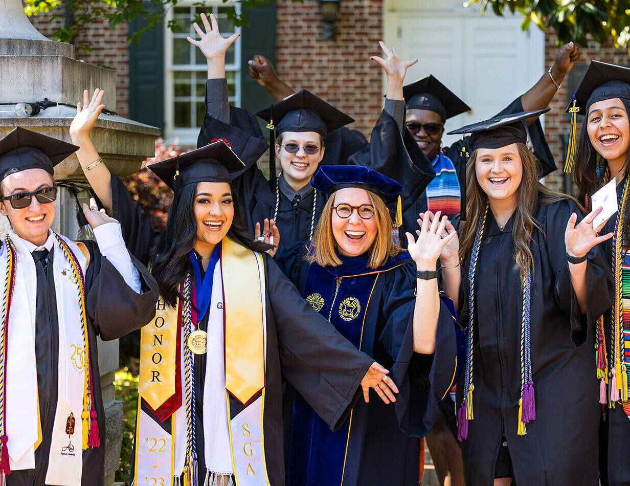 Salem College students at graduation with President McGee