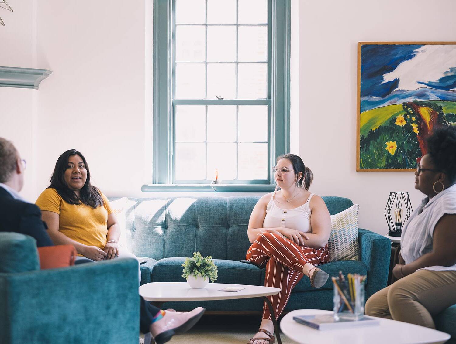 People in discussion together in an office.