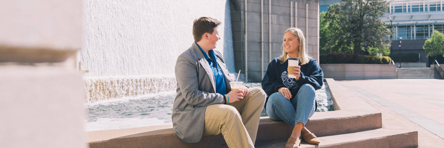 Two Salem College staff members in downtown Winston Salem